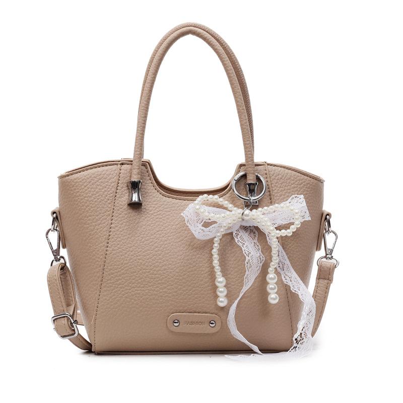 Korean version of the trend hand-carried bucket bag women's summer 2025 new simple fashion versatile shoulder bag niche high sense