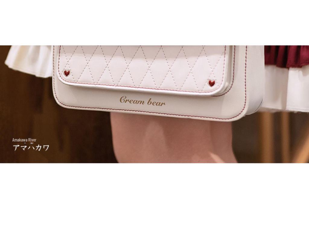 Elegant kremfarget bjørnedress i collegestil for jenter - Komplett sett