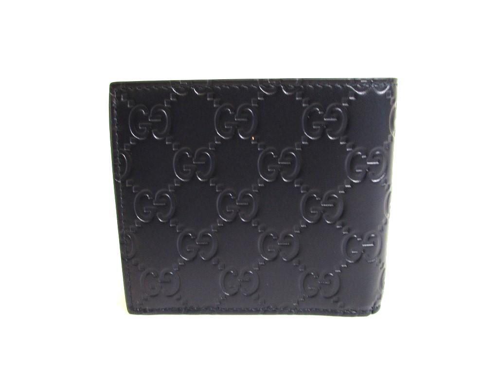 Autentyczny portfel GUCCI GG Metal Guccissima Granatowy Skórzany Podwójnie Składany #9947 Otwarte pudełko