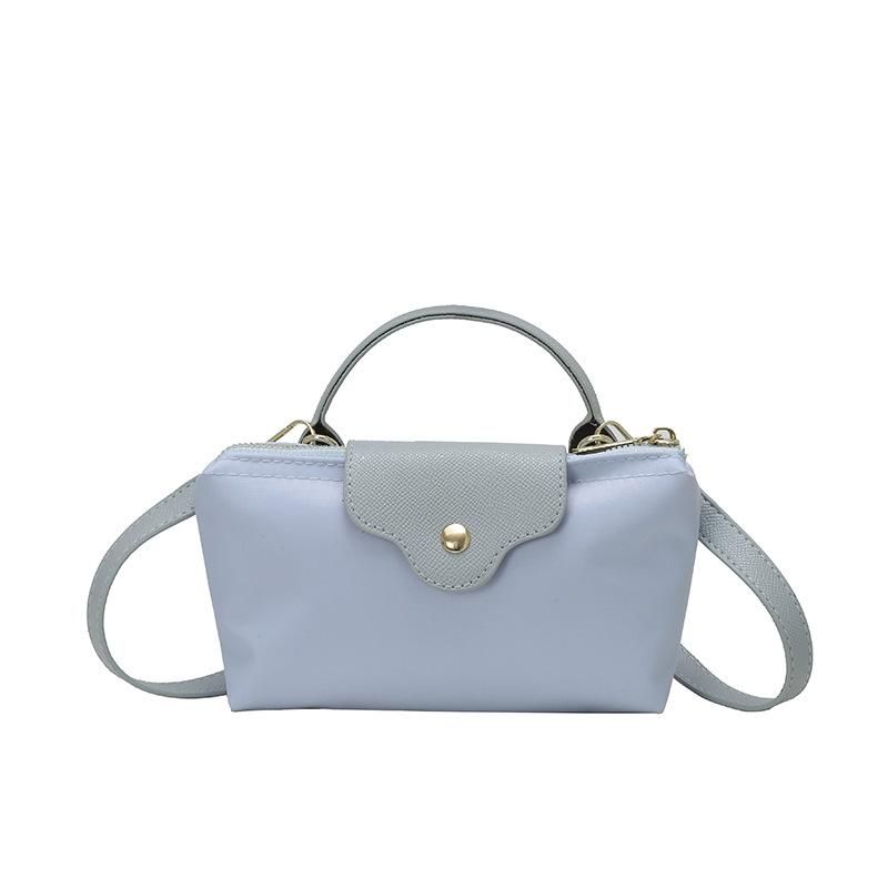 Niche machine bag nylon cloth portable dumpling bag new shoulder crossbody small bag hand change bag tide