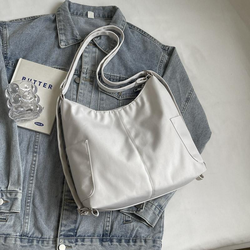 Einfarbige Tragetasche Damen-Schultertasche Große Kapazität Reise-Rucksack Umhängetasche