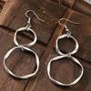 1 Paar Kreative Gedrehte Unendlichkeits-Schleifen-Hängeohrringe mit Langem Ring-Anhänger, Geeignet für das Tägliche Tragen von Frauen