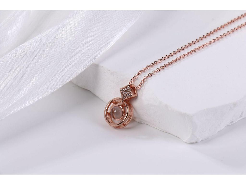 Trendy Women's Necklace: Rose Gold Elf's Tears Pendant Projection