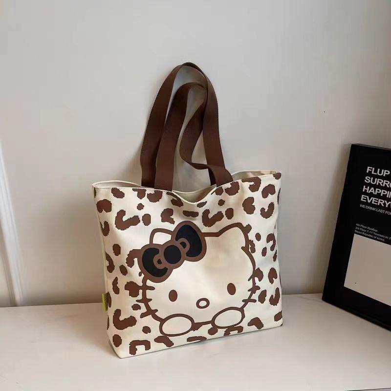 Cartoon canvas bag, women's versatile shoulder commuter tote bag, large-capacity student class handheld book gift bag