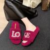 Fashionable letters wear thick-soled fluffy slippers 2025 new suede one-word drag autumn and winter warm cotton drag women's shoes