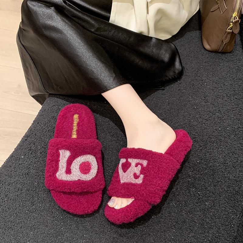 Fashionable letters wear thick-soled fluffy slippers 2025 new suede one-word drag autumn and winter warm cotton drag women's shoes