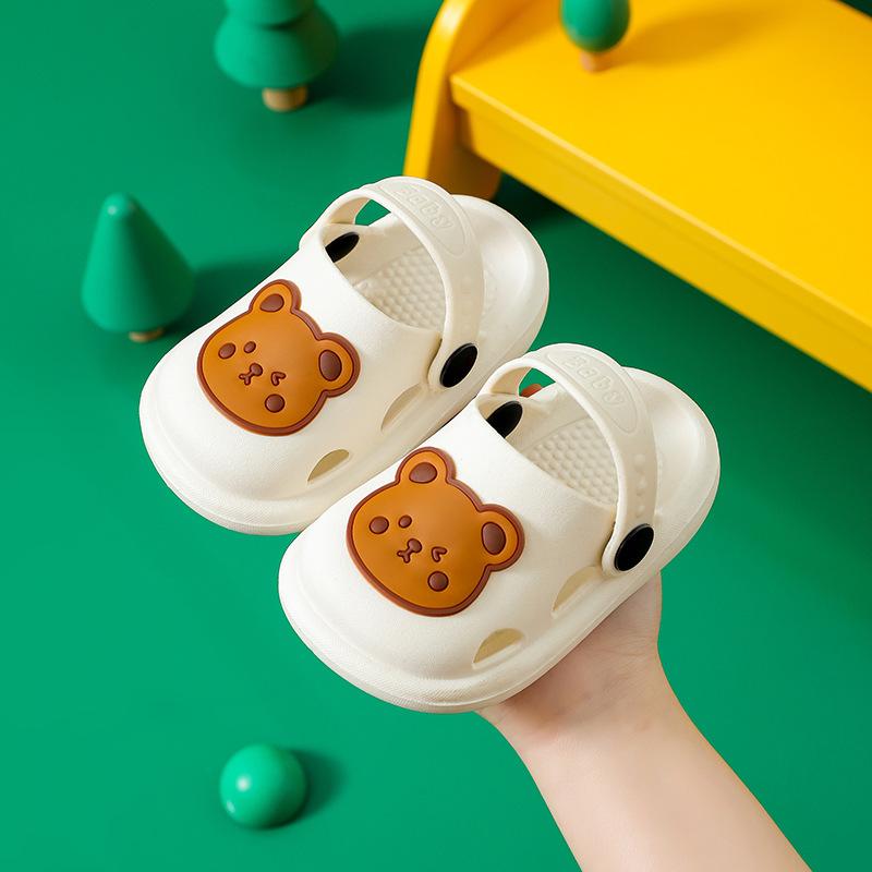 Children's hole shoes boys and girls beach shoes medium and large children's bag head anti-collision children's cool slippers hollow