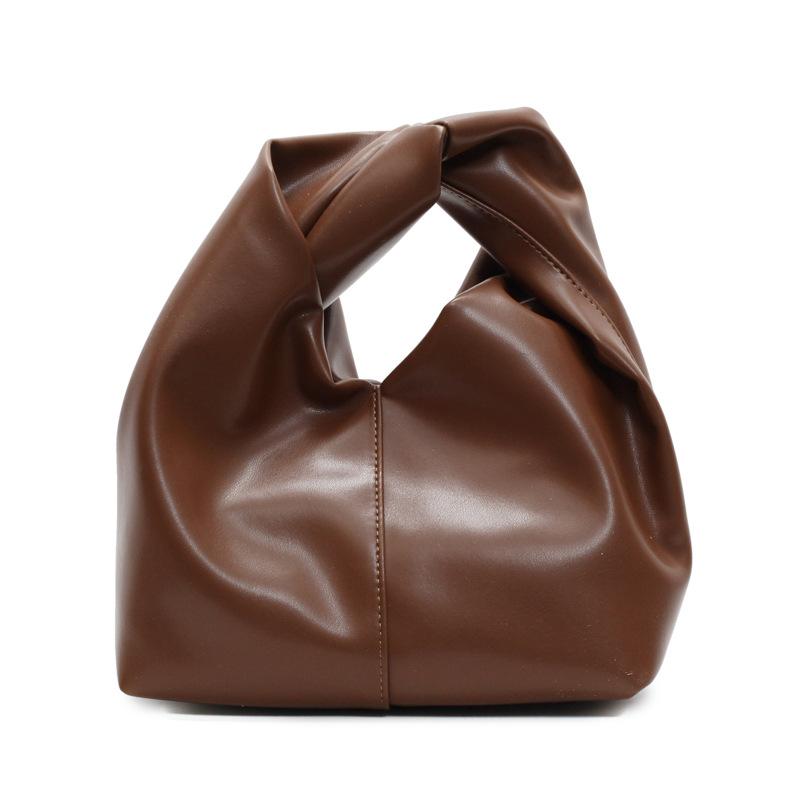 Niche design lazy wind commuter handbag female 2026 spring and summer texture hand bag