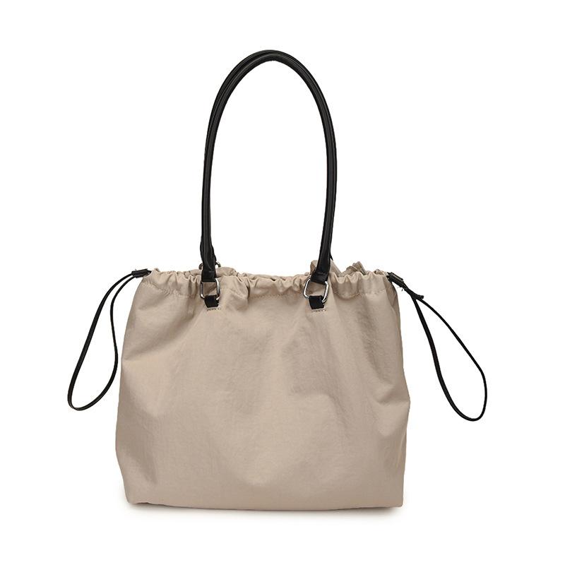 

New waterproof cloth shoulder leisure bag large capacity bundle drawstring bag commuter travel tote bag