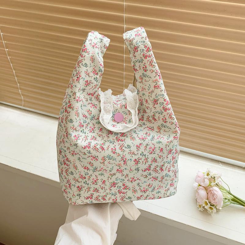 

Summer new Korean small floral cute handbag sweet lace wrist bag going out portable handbag