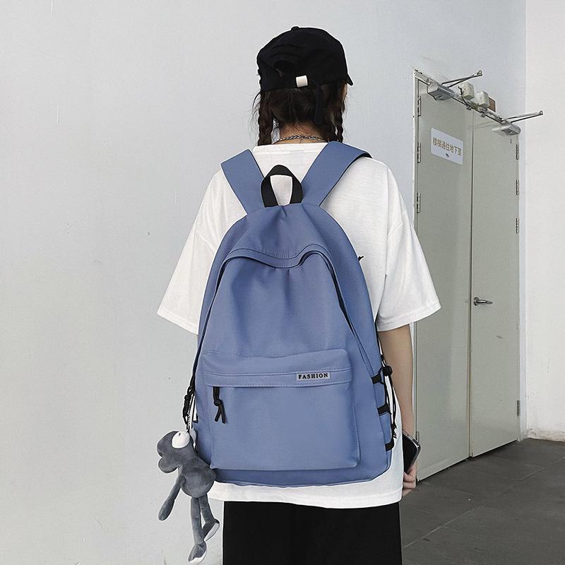 New Casual Backpack Simple College Style Backpack Large Capacity Student Bag Men and Women Couple Bag Travel Bag