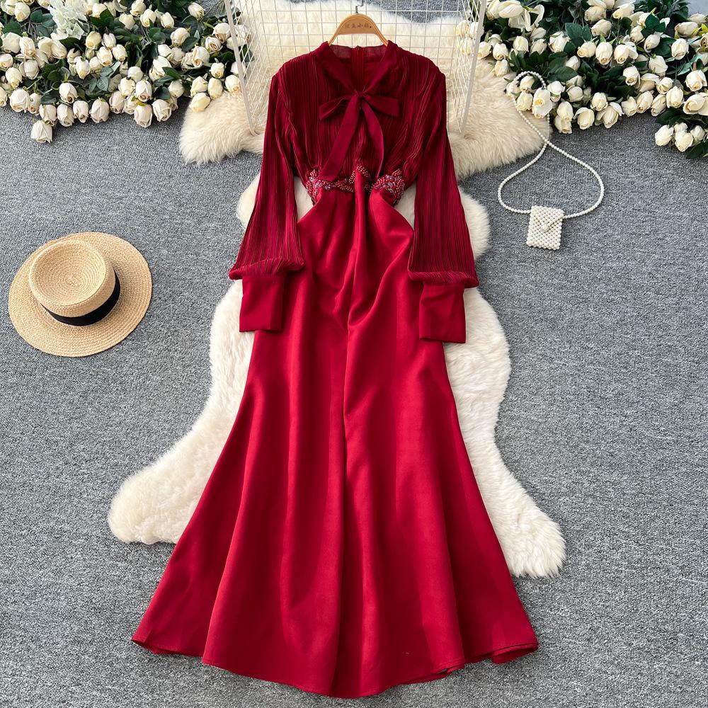 Light ripe style bow strap lantern sleeve top high waist A-shaped skirt women's commuting temperament two-piece set high sense