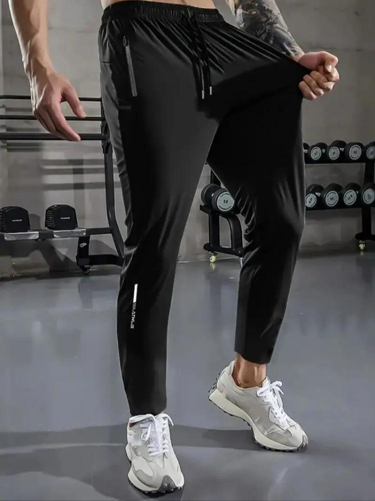 Herren Freizeit-Sporthose, Hochdehnbare Webware, Einfarbig, Normale Passform mit Kordelzugbund und Reißverschluss