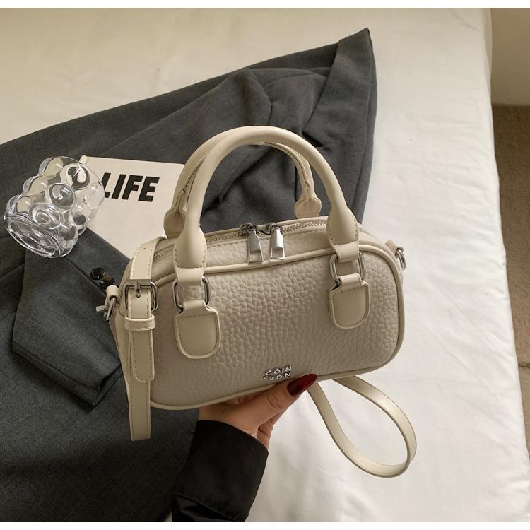 

Retro beautiful small fresh spring women s new trendy hand-held bowling bag casual crossbody shell bag