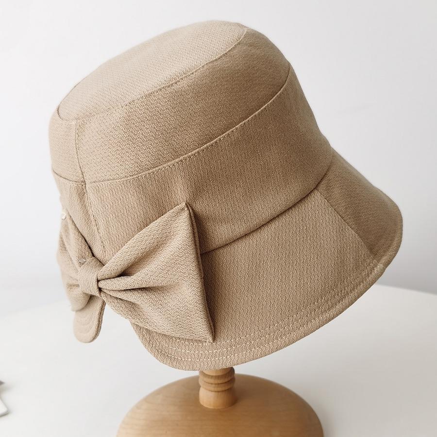 

Spring and Autumn thin foldable bucket hat female face small bow basin hat casual travel sun hat child tide Adult average size бежевий