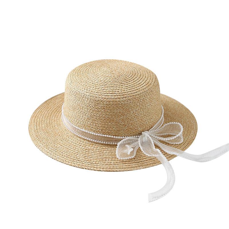 New French Lafite Sweet Bow Straw Hat Women's Spring Summer Simple Sunscreen Breathable Sunshade Elegant Flat Top Hat