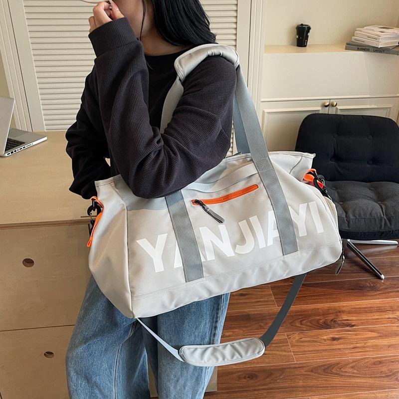 Trend casual lightweight travel bag men's and women's outdoor camping sports storage satchel versatile fashion short-haul duffel bag