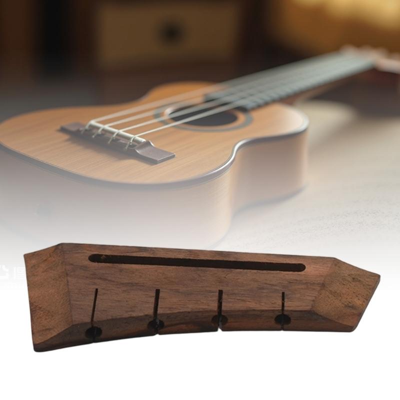 Haltbare Holz-Ukulele-Brücke Akustikgitarren-Brücke Feingearbeitete Gitarrenbrücke zur Verbesserung der Schallübertragung