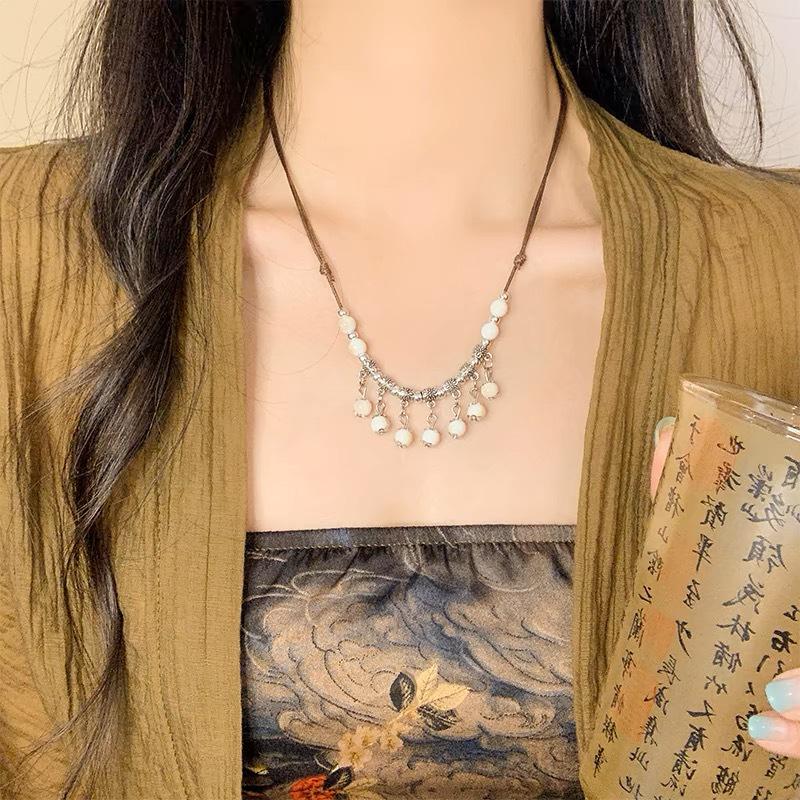 Bohemian Ethnic Style Long Bow Metal Necklace with Vintage Distressed Pendant (2025)