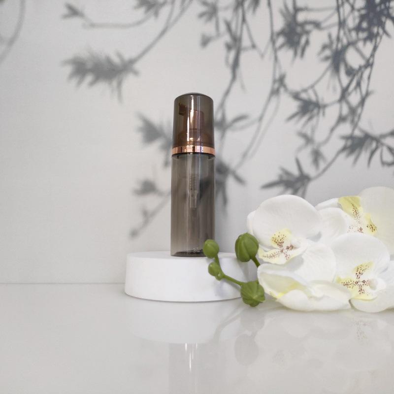 Available 60ml Transparent Black Foam Mousse Bottle for Face Wash and Travel-friendly Cosmetic Packaging.
