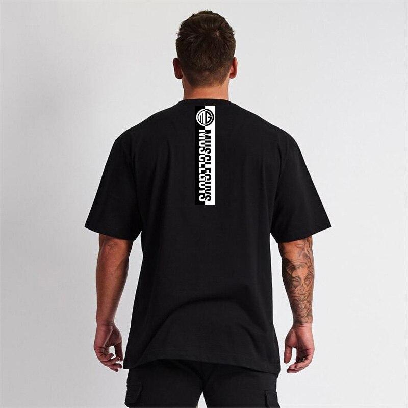 Muscleguys Muscleguys Мужская футболка с коротким рукавом Летняя свободная принт Половина рукава Бодибилдинг Тренд Большой размер Топ M чёрный