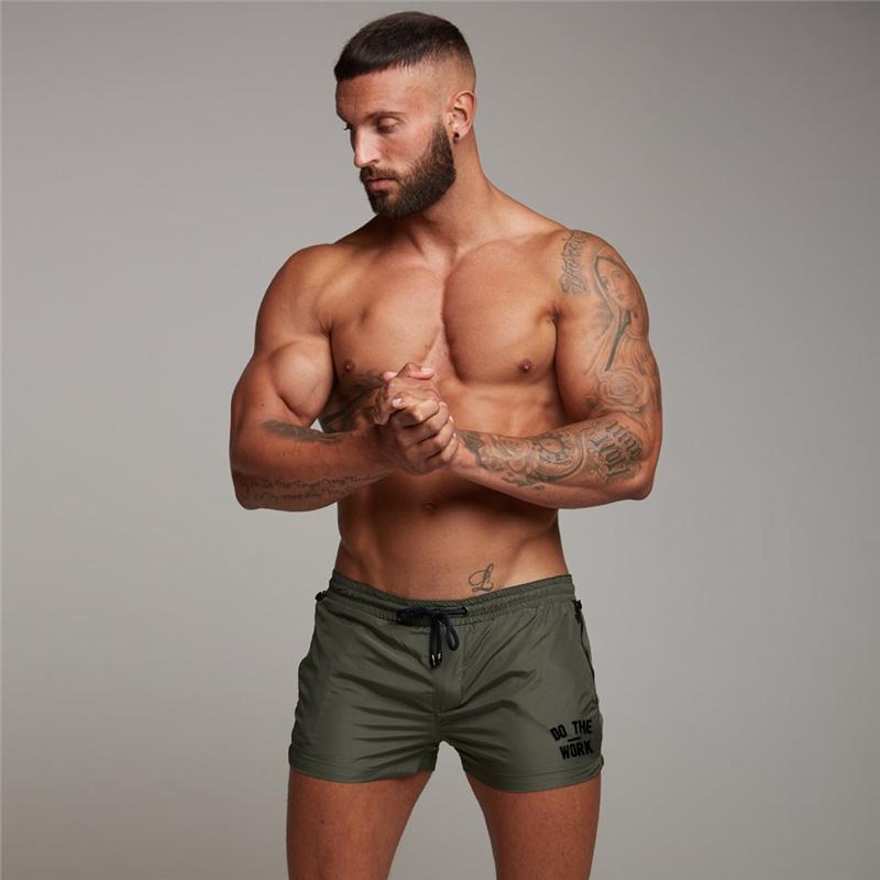 Muscleguys Letní novinka Workout Mens Beach Board Shorts Slim Fitness běžecké šortky rychleschnoucí