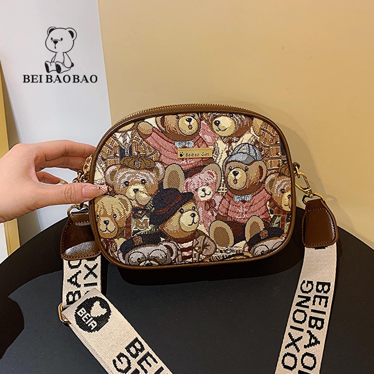 

Кругла сумка кросбоді Плюшевий ведмедик - видання 2025 для жінок коричневий