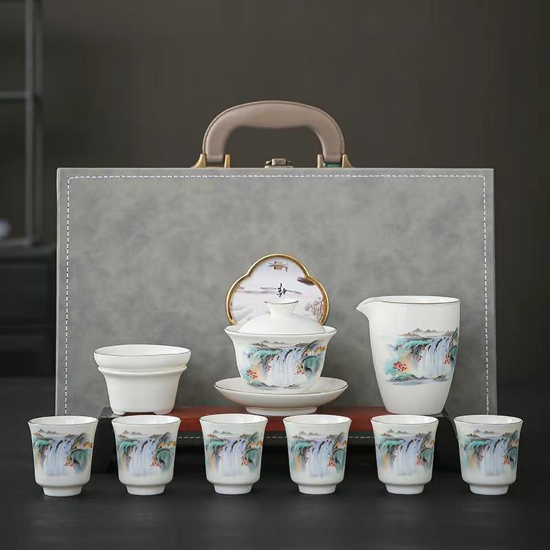 

New Dehua suet jade white porcelain gold-painted kung fu tea set, household light luxury and high-end tea cups for customers