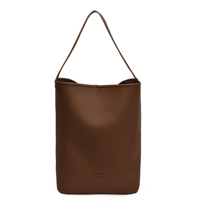 Retro casual bucket bag women's simple fashion shoulder bag large capacity sense high sense commuter messenger bag