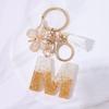 Chic White Tassel Letter Keychain with Resin Epoxy Pendant - Stylish Ornament for Bags