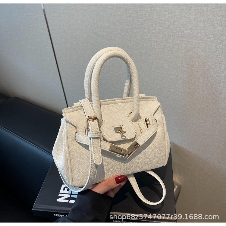 Princess Diana bag 2025 spring new women's lychee pattern Kelly bag portable messenger bag single shoulder commuter platinum bag