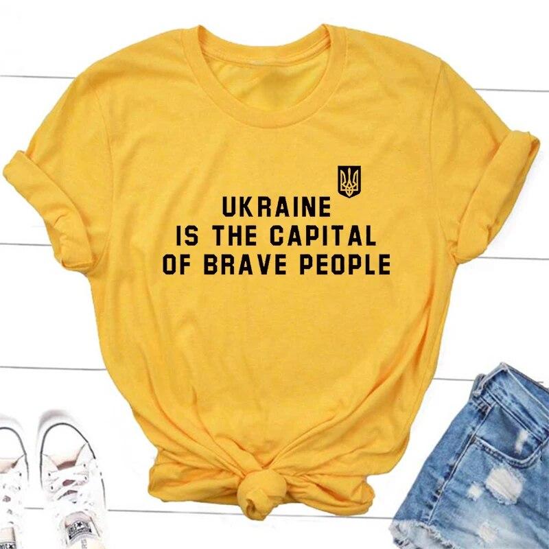 

Kraine Is Capital of Brave People Футболка Жіноча унісекс Українська футболка Бавовняна повсякденна футболка з коротким рукавом Синьо-жовта Футболка унісекс 4XL