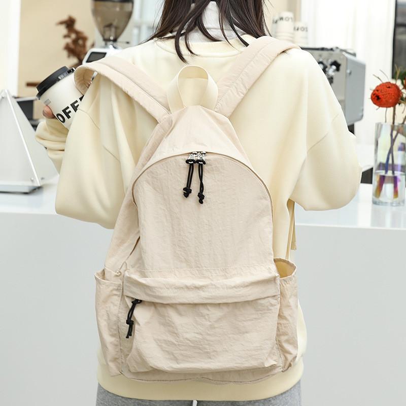 IELGY Japanese casual literary canvas schoolbag, simple washing water and old backpack, khaki fashion nylon backpack.