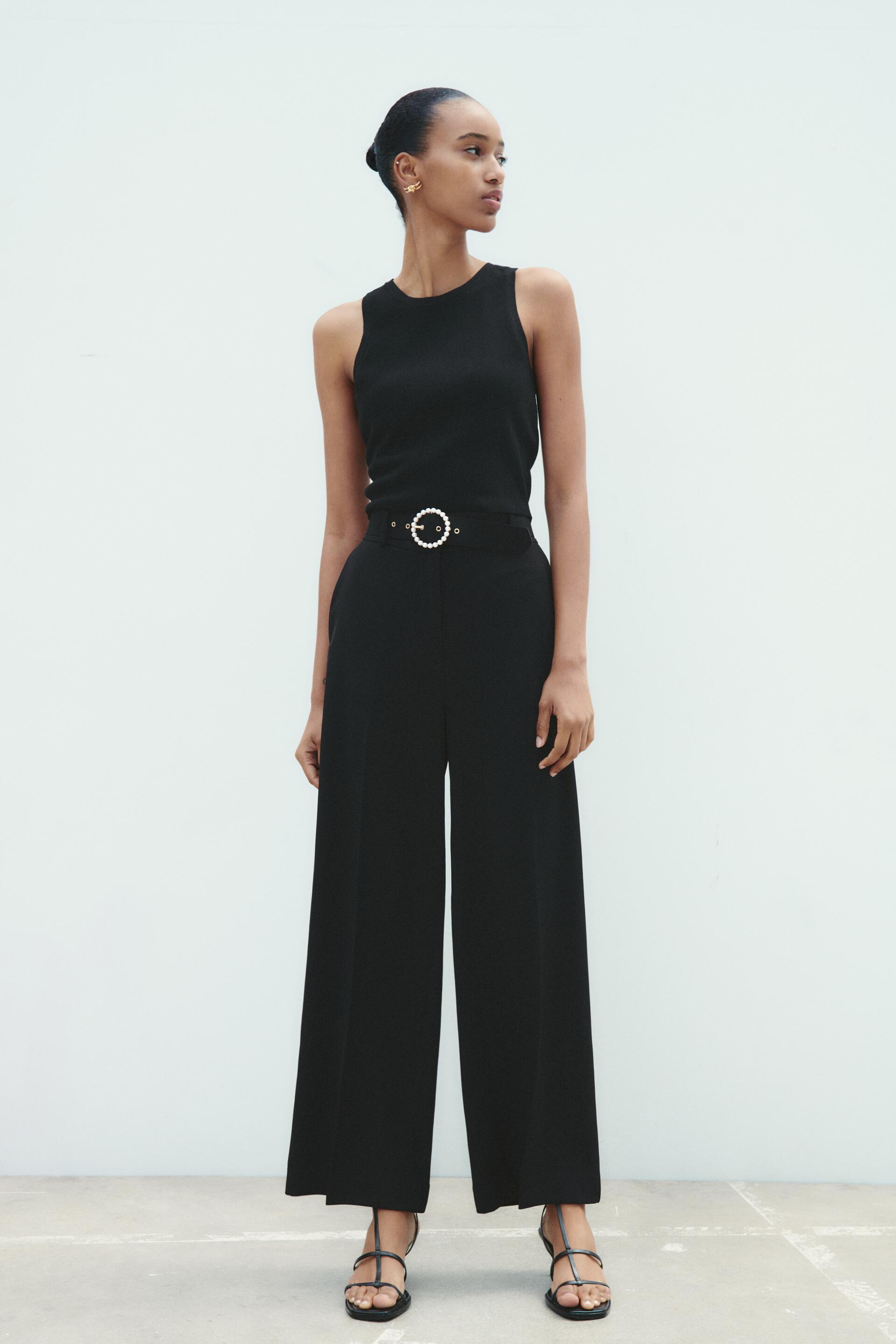 

КЮЛОТЫ С ПОЯСОМ И ИСКУССТВЕННЫМ ЖЕМЧУГОМ