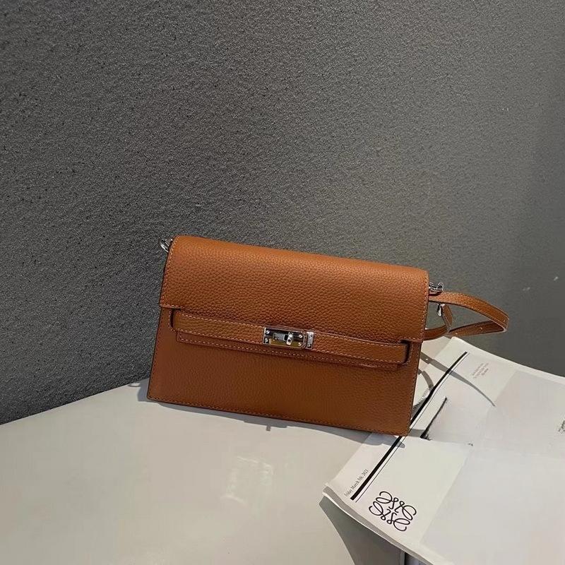 New lychee pattern leather half cover hand grab bag genuine leather women's bag single shoulder underarm bag oblique span bag wholesale