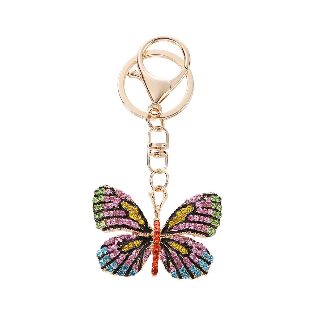 

Dreamy Gem Butterfly Pendant Keychain – Colorful Crystal Insect Design, Exquisite Bag Accessory and Gift.