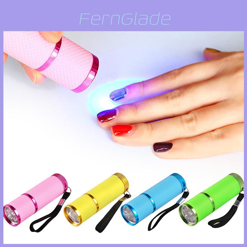 Kompakte LED Nagelhärtelampe Taschenlampe mit schwarzer Trageschlaufe für einfachen Transport und geringen Stromverbrauch