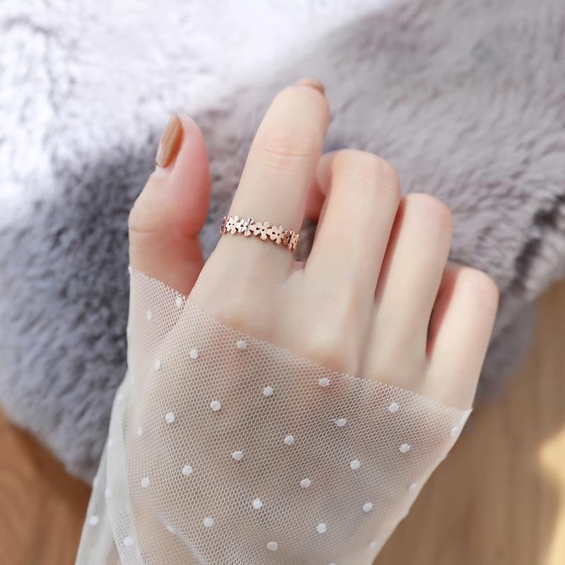 Korean Style Gold-Plated Titanium Steel Hollow Flower Ring for Women