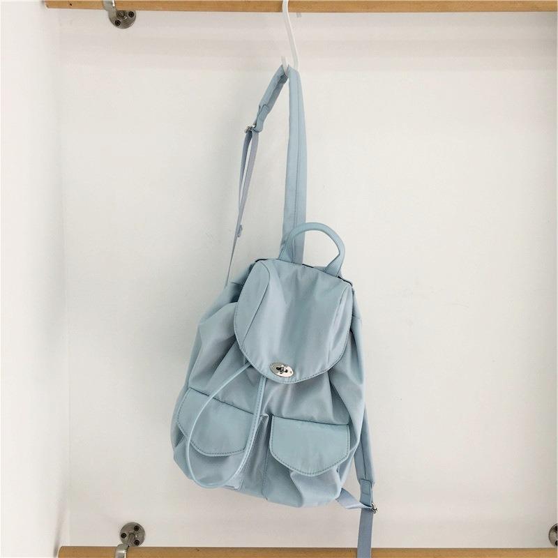 Nouveau sac à dos en nylon imperméable anti-rides pour femme, été décontracté, multi-poches, couleur unie, sac à dos de ville