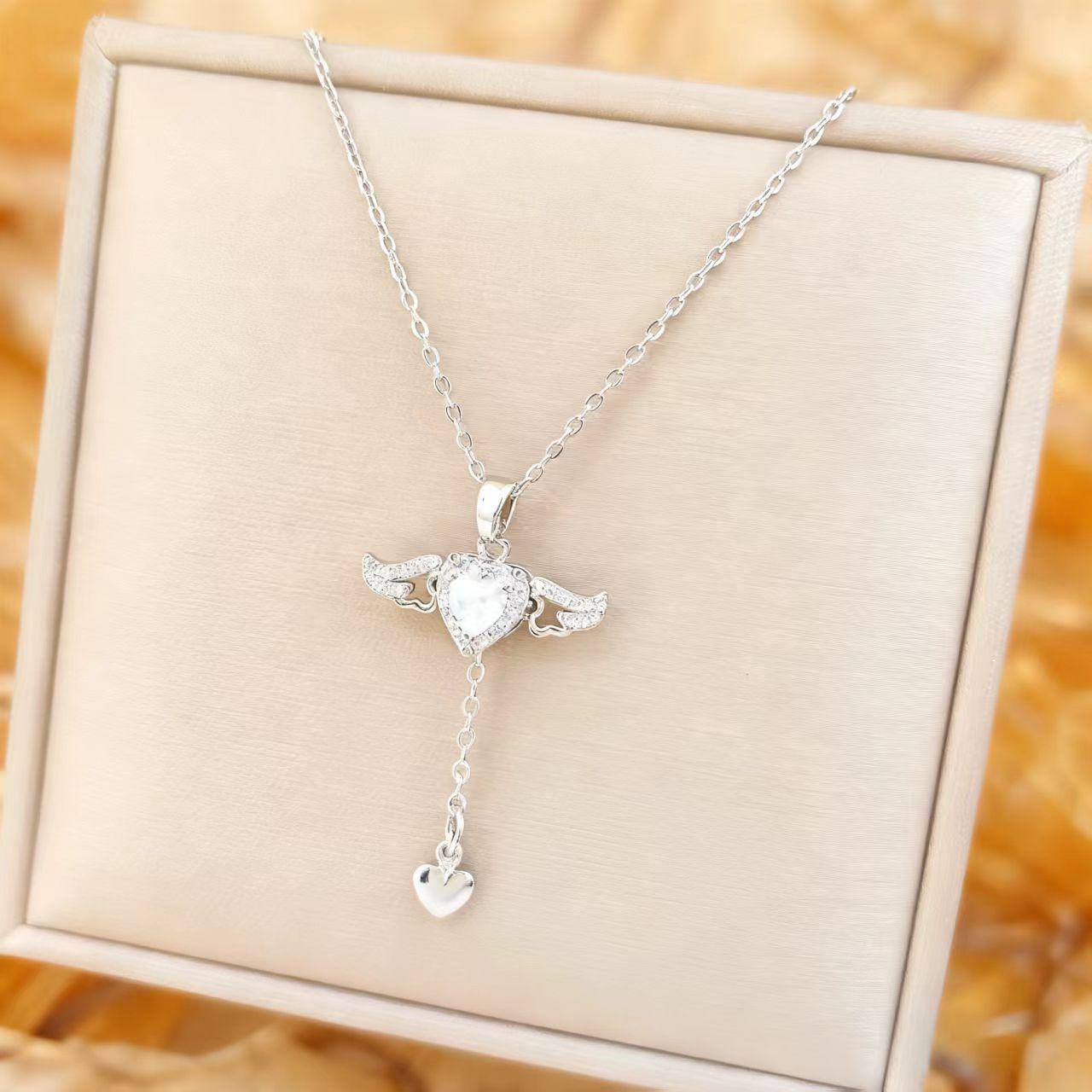 

Cupid Angel Wings Heart Necklace with Moving Tassel Pendant for Women