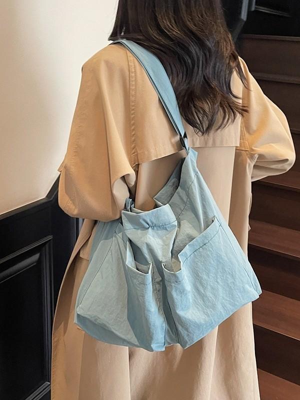 Borsa a tracolla minimalista in tela con chiusura a zip per uso quotidiano casual