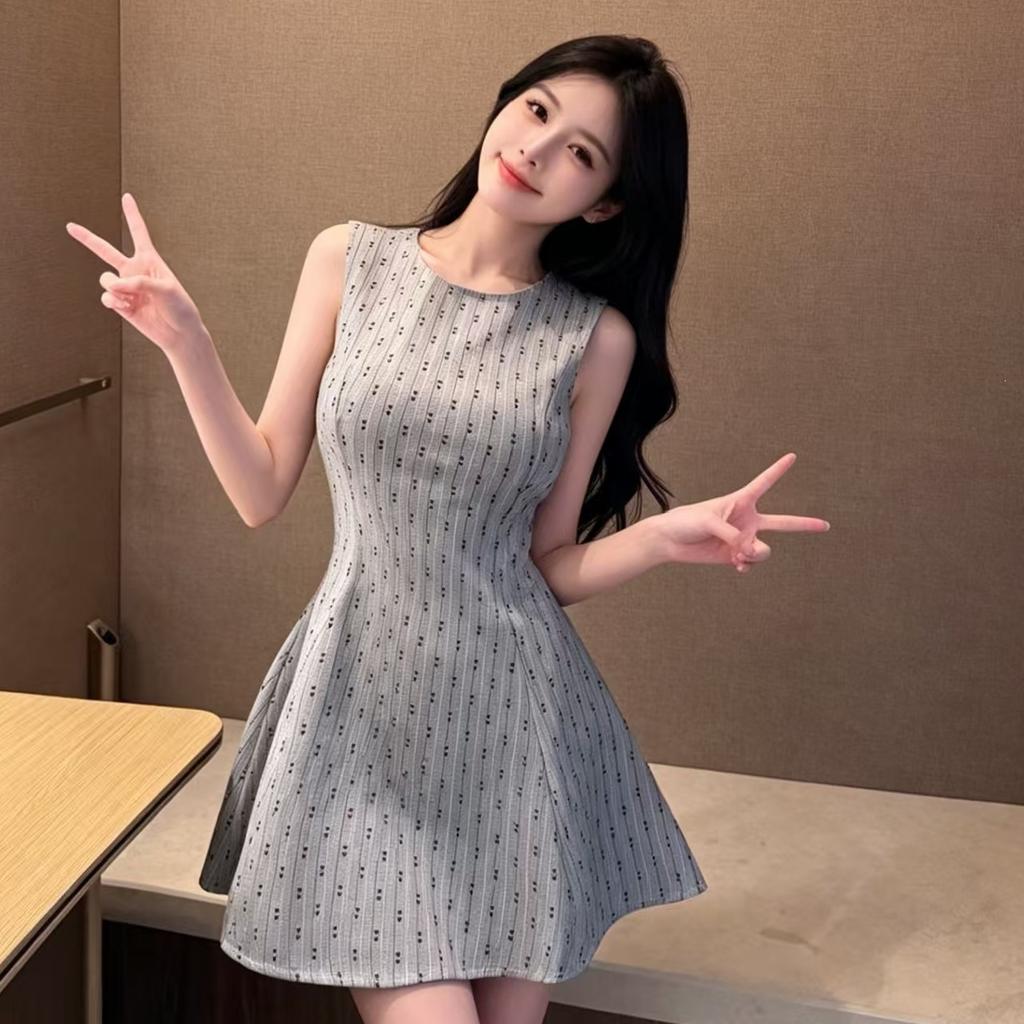 Crew neck sleeveless printed vest dress niche French commuter sexy high waist fluffy and thin A-shaped short skirt