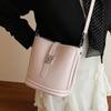 Korean new product, sweet and light color, gentle wind temperament bucket bag, women's commuting versatile and advanced messenger bag