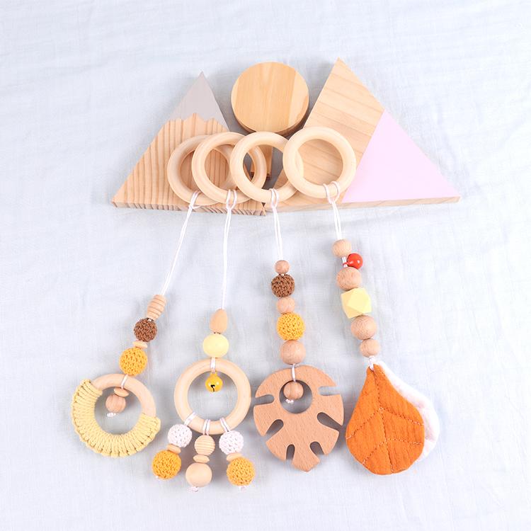 China Manufacturer Exquisite Color Leaf Four-piece Fitness Rack Pendant Wooden Baby Play Activity Gym