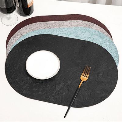 Strapazierfähige ovale Tischsets Rutschfest 3D Blume geschnitzt Untersetzer Ölfest PU-Leder Esstisch Platzmatten Hotel