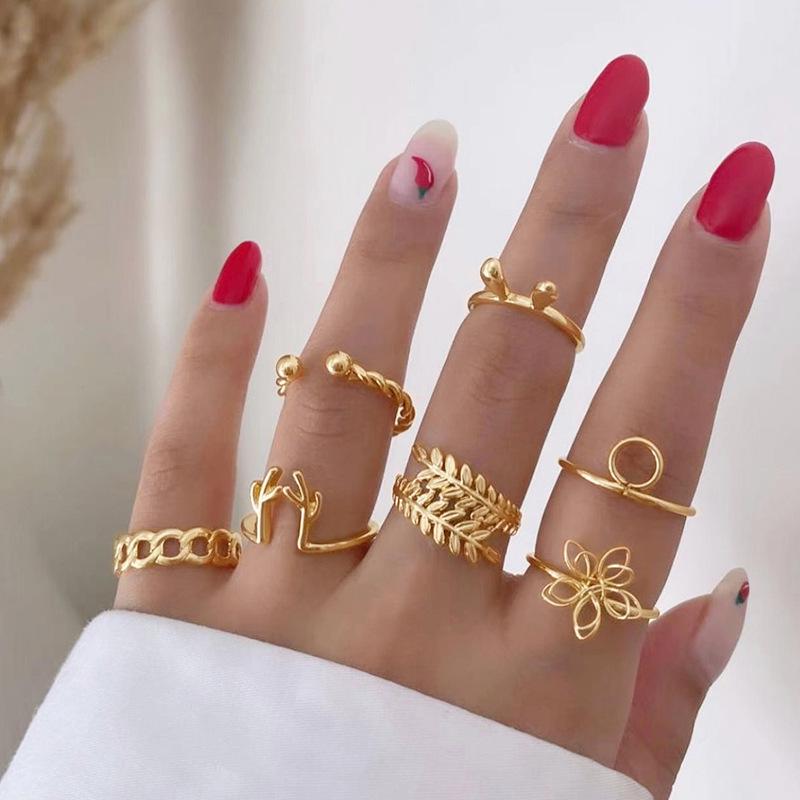 

Retro 18k Gold Leaf Flower & Rabbit Antler Stackable Rings - 7-Piece Set