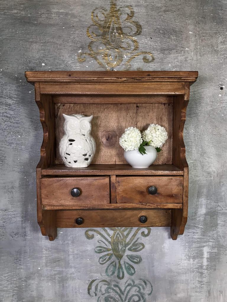 Brown wooden cabinet with drawers, rustic style