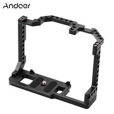 Andoer Camera Cage κράμα αλουμινίου με διπλή βάση κρύου παπουτσιού 1/4 ιντσών βίδα συμβατή με Canon