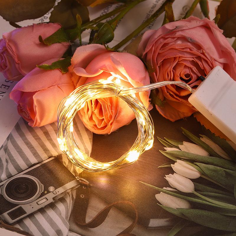 LED Fairy Lights String: Small Copper Wire Decoration with Battery Box, Ideal for Christmas and Outdoor Atmosphere Lighting.