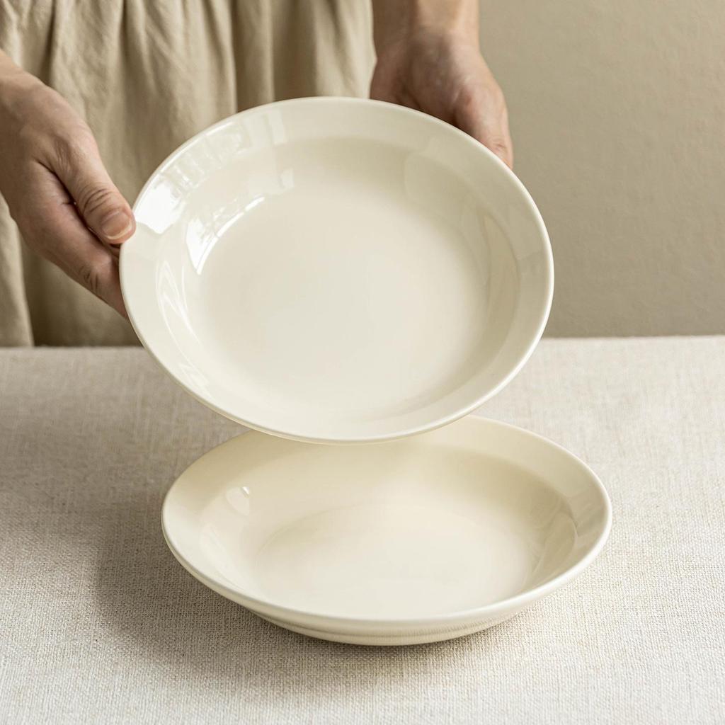 Cream-Colored Minimalist Ceramic Tableware: Deep, Round Plates for Vegetables, Dinner, and Salads.
